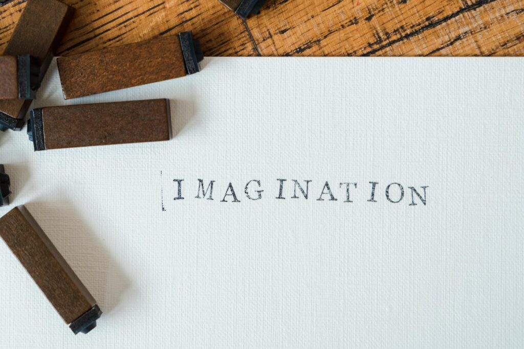 Imagination Word Stamped on Paper