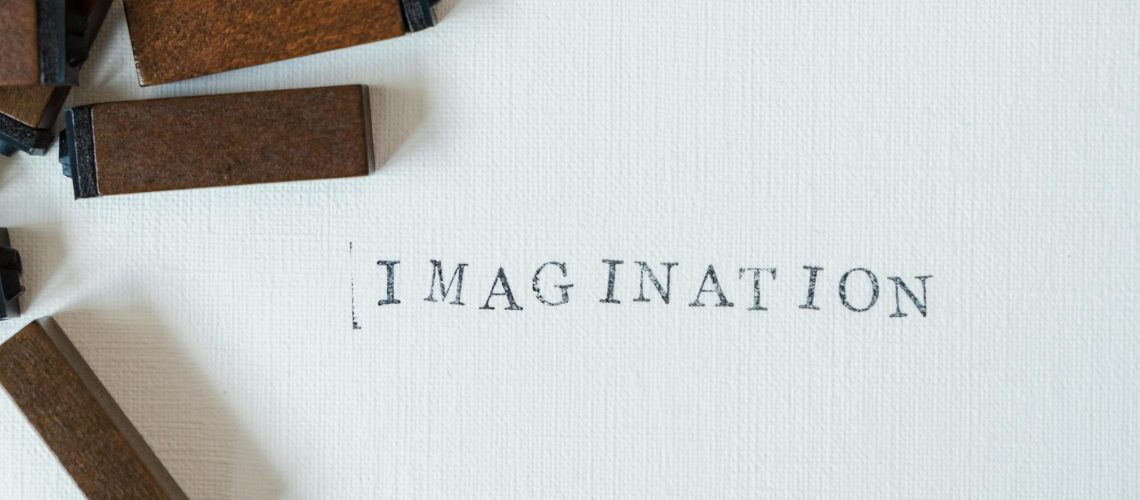 Imagination Word Stamped on Paper